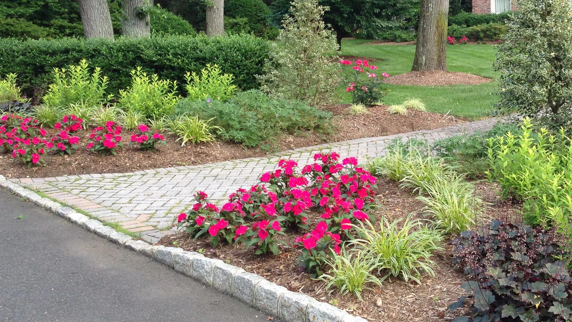 Professionally maintained landscape design at a residential property in Watchung.