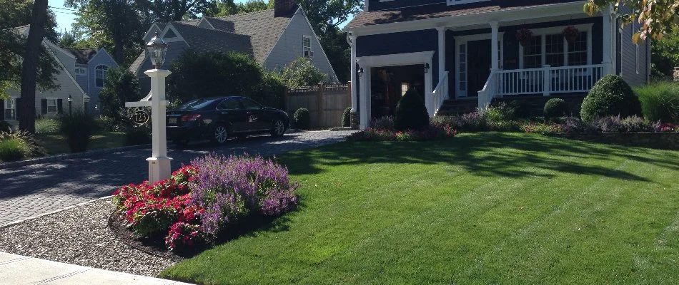 Home in Westfield, NJ, with a green lawn.