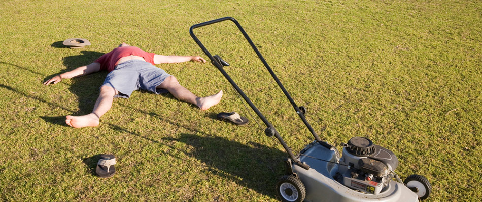 Man Lying On Grass After Mowing in Plainfield, NJ