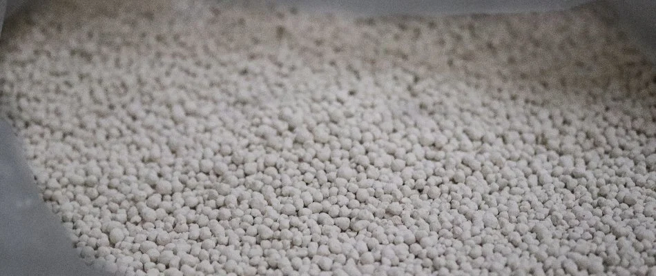 Bag full of white lime pellets for a lawn in Westfield, NJ.