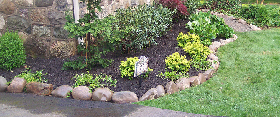 A landscape bed with mulching and plantings added in Fanwood, NJ.